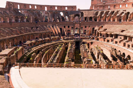 Rome, Italy - April 7, 2013: Ancient Roman Coliseum sees around 4 million tourists a year and is the...