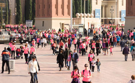 Barcelona, Spain- November 8, 2015: Participants of the annual Breast Cancer Awareness Run on the streets of Barcelona.のeditorial素材