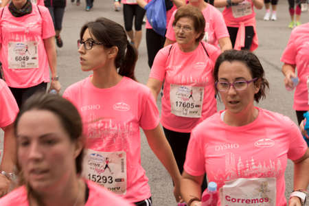 Barcelona, Spain- November 8, 2015: Participants of the annual Breast Cancer Awareness Run on the streets of Barcelona.のeditorial素材