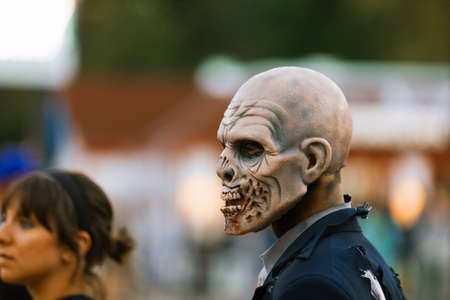 Jackson, USA-September 24, 2016: Street performer in Halloween costume and makeup is entertaining crowds.のeditorial素材