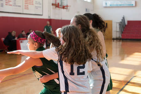 Staten Island, USA-December10,2016: Girl basketball OLHA team squares off with Team St.Patrick. Teams are sponsored by The Catholic Youth Organization of the Archdiocese of New York.のeditorial素材