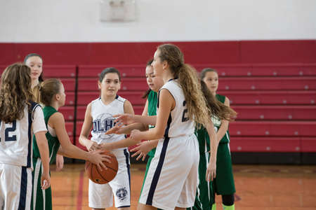 Staten Island, USA-December10,2016: Girl basketball OLHA team squares off with Team St.Patrick. Teams are sponsored by The Catholic Youth Organization of the Archdiocese of New York.のeditorial素材