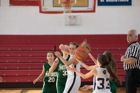 Staten Island, USA-December10,2016: Girl basketball OLHA team squares off with Team St.Patrick. Teams are sponsored by The Catholic Youth Organization of the Archdiocese of New York.のeditorial素材