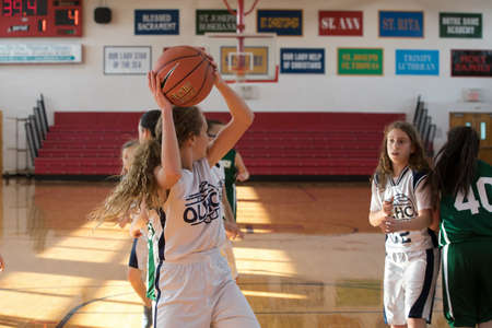 Staten Island, USA-December10,2016: Girl basketball OLHA team squares off with Team St.Patrick. Teams are sponsored by The Catholic Youth Organization of the Archdiocese of New York.のeditorial素材