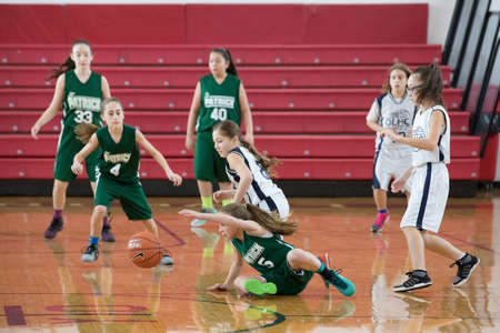 Staten Island, USA-December10,2016: Girl basketball OLHA team squares off with Team St.Patrick. Teams are sponsored by The Catholic Youth Organization of the Archdiocese of New York.のeditorial素材