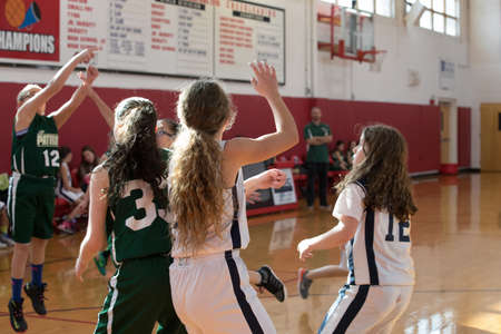 Staten Island, USA-December10,2016: Girl basketball OLHA team squares off with Team St.Patrick. Teams are sponsored by The Catholic Youth Organization of the Archdiocese of New York.のeditorial素材