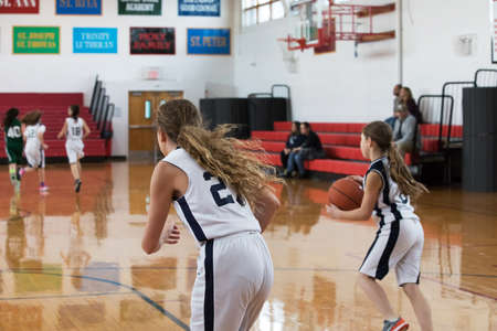 Staten Island, USA-December10,2016: Girl basketball OLHA team squares off with Team St.Patrick. Teams are sponsored by The Catholic Youth Organization of the Archdiocese of New York.のeditorial素材