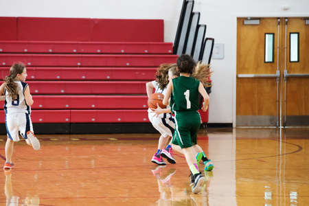 Staten Island, USA-December10,2016: Girl basketball OLHA team squares off with Team St.Patrick. Teams are sponsored by The Catholic Youth Organization of the Archdiocese of New York.のeditorial素材
