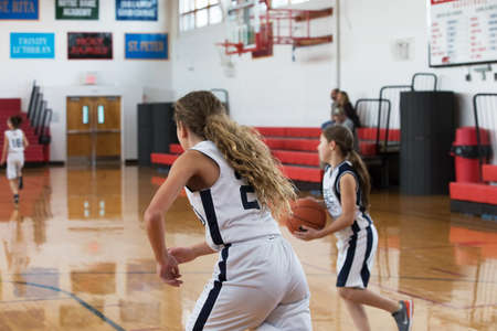 Staten Island, USA-December10,2016: Girl basketball OLHA team squares off with Team St.Patrick. Teams are sponsored by The Catholic Youth Organization of the Archdiocese of New York.のeditorial素材