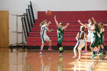 Staten Island, USA-December10,2016: Girl basketball OLHA team squares off with Team St.Patrick. Teams are sponsored by The Catholic Youth Organization of the Archdiocese of New York.のeditorial素材