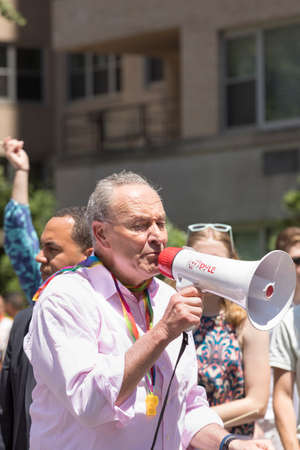 New York City, USA-June 25, 2017: U.S. Senator Charles Ellis âChuckâ Schumer participates in NYC Pride March. Gay Pride events occur throughout the month of June, culminating with the March along the 5th Avenue.のeditorial素材