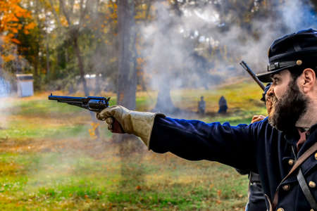Coventry,RI,USA-October 28, 2017: Unknown local residents participating in a Civil War Era encampment and skirmish re-enactments.のeditorial素材