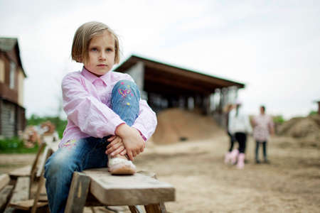 Little girl is happy and playing in natureの写真素材