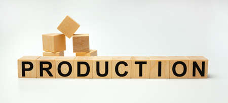 Wooden blocks with the word Production. Business conceptの写真素材
