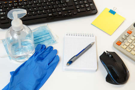 Office space wiping corona virus cleaning and disinfection of your workspace. On the desktop,...