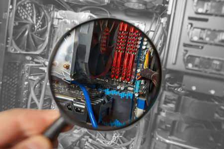 Computer repair concept. Diagnostics of components of an old computer.の写真素材