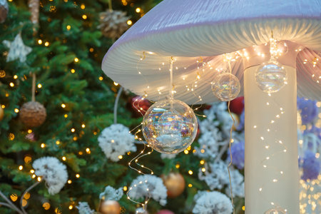 Christmas or New Year composition, Christmas decoration close-up on a background of lightsの写真素材