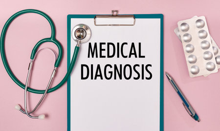 Worksheet with the inscription Medical Diagnosis, stethoscope and pills, top viewの写真素材