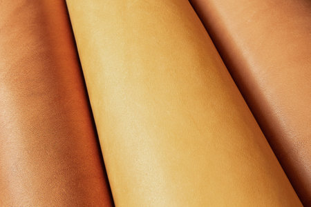 Combined background from natural light brown and dark brown leather
