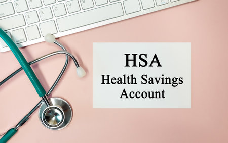 HSA-Health Savings Account. Keyboard and stethoscope. Medical conceptの写真素材