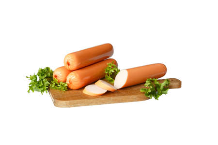 Sausages with lettuce leaves on a wooden board. Isolate on a white background.の写真素材