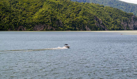 Speed boat on Danube river on a sunny day.の写真素材