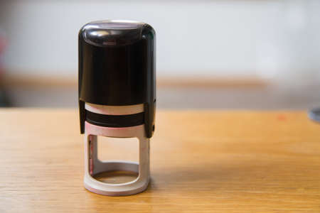Automatic stamp on a deskの写真素材