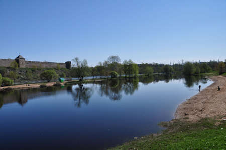 River Narova with russian castle on the background.の写真素材