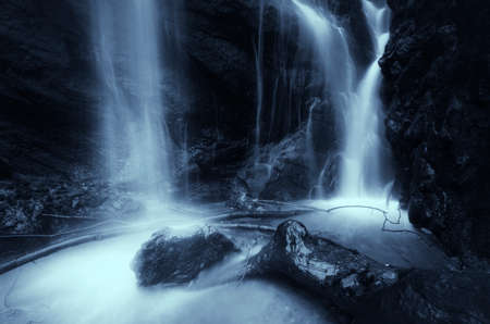 Waterfall on mountain river detail