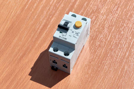 On the table there is an automatic switch of differential current. The device protects human life...