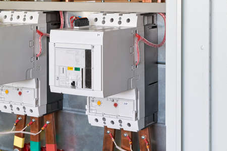 High current power circuit breaker with motor drive for remote control in electric Cabinet. The switches have fine tuning and parameter adjustment. Modern and reliable power supply.の写真素材