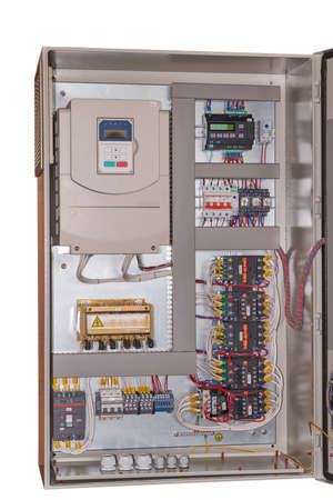Frequency Converter, controller, thermostat, circuit breaker, intermediate relays, contactors with additional contacts and thermal relay, voltage transformer in the electrical Cabinet.の写真素材