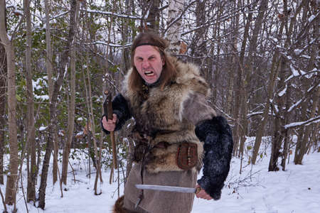Izborsk, Pskov region, Russia - November 5, 2016: Pskov region. Izborsk fortress. The local resident depicts an ancient warrior - the defender of the fortress.のeditorial素材