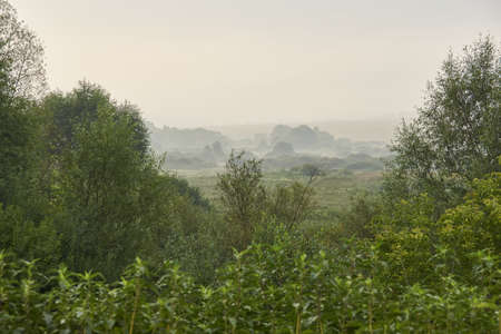 Sunrise over the lake. Fishing on the lake. Recreation center. August 2021.の写真素材