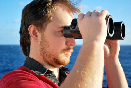 navigator on the watch on bridge of chemical tankerの写真素材