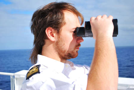 navigator on the watch on bridge of chemical tankerの写真素材