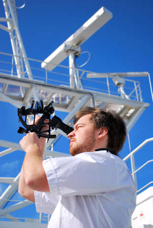 navigator on the watch on bridge of chemical tankerの写真素材
