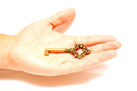 key in the palm on white