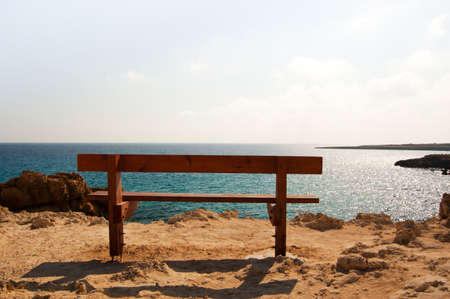 alone bench near the sea in cape greco