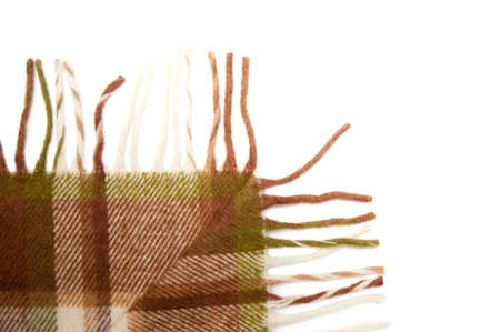 beige-brown woolen plaid isolated on whiteの写真素材