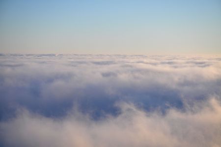 Sunset above the clouds