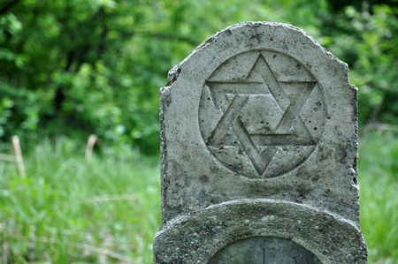 Old tombstone with the star of davidの写真素材