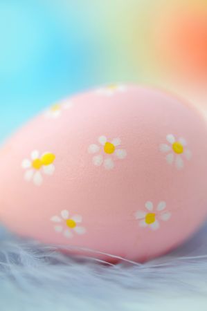 Easter egg on featherの写真素材