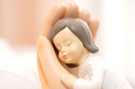 Small ceramic girl toy closeupの写真素材