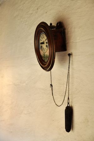 Old clock an a wall