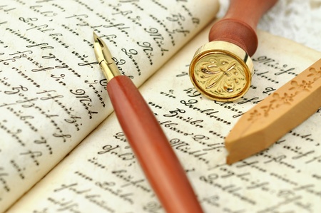 Fountain pen, seal and wax on an old diary