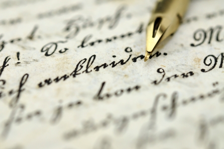 Fountain pen on an old diaryの写真素材