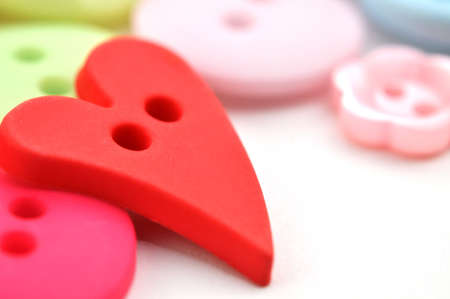 Colorful buttons closeup, isolated on white