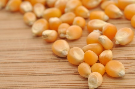 Corn on a wooden cutting board