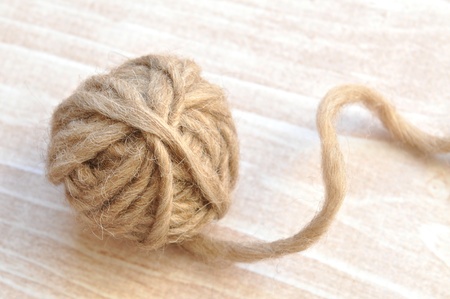 One ball of brown wool yarnの写真素材